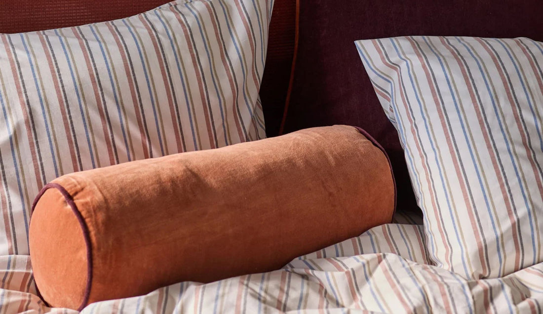 Up close shot of a cozy bed.