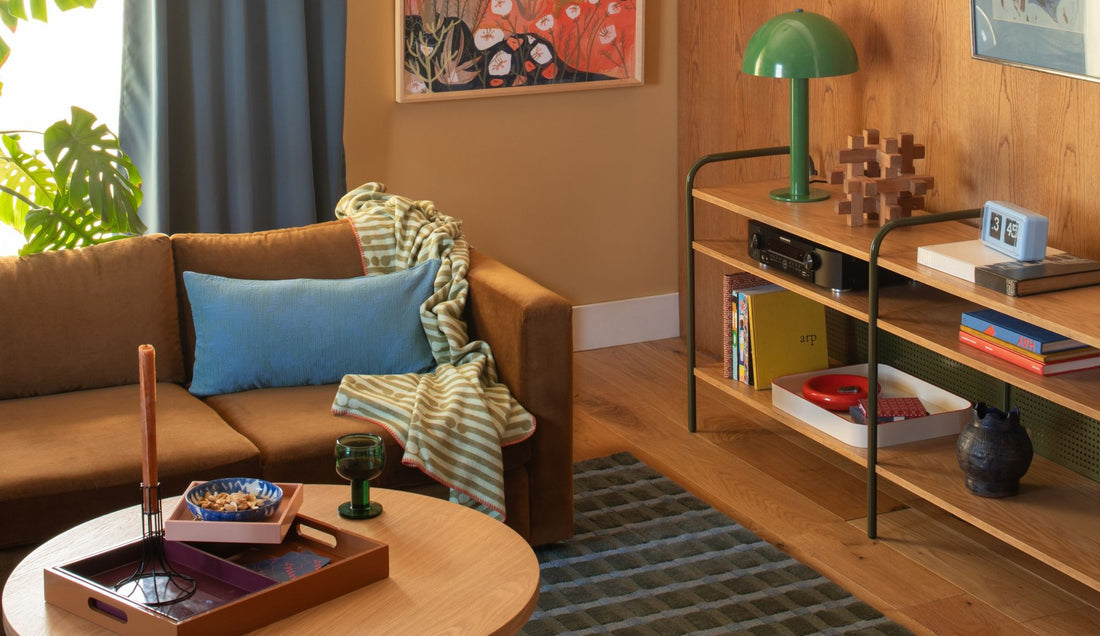 Living room with wood paneled walls