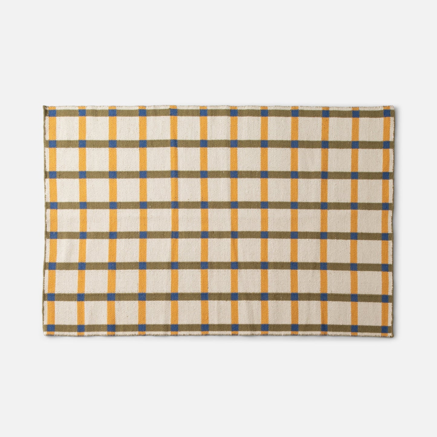 Cropped top-edge view of Plaid Wool Reversible Rug showing yellow and olive plaid with blue checks on white background