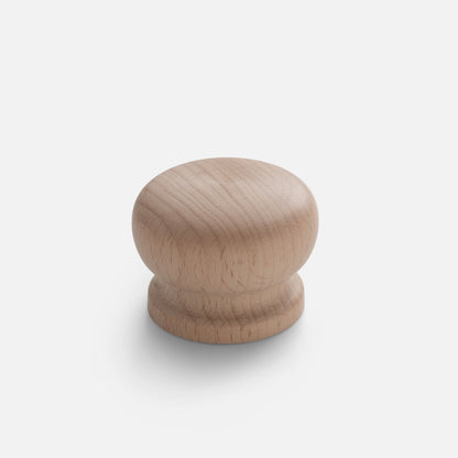 Front view of Turned Wood Knob showcasing natural wood grain with a light gray background
