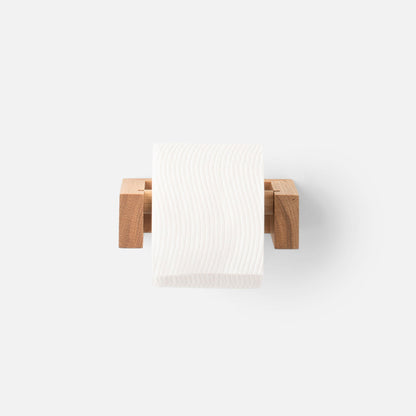 Front view of Oak Tissue Roll Holder showcasing natural oak wood and a white tissue roll on a light background