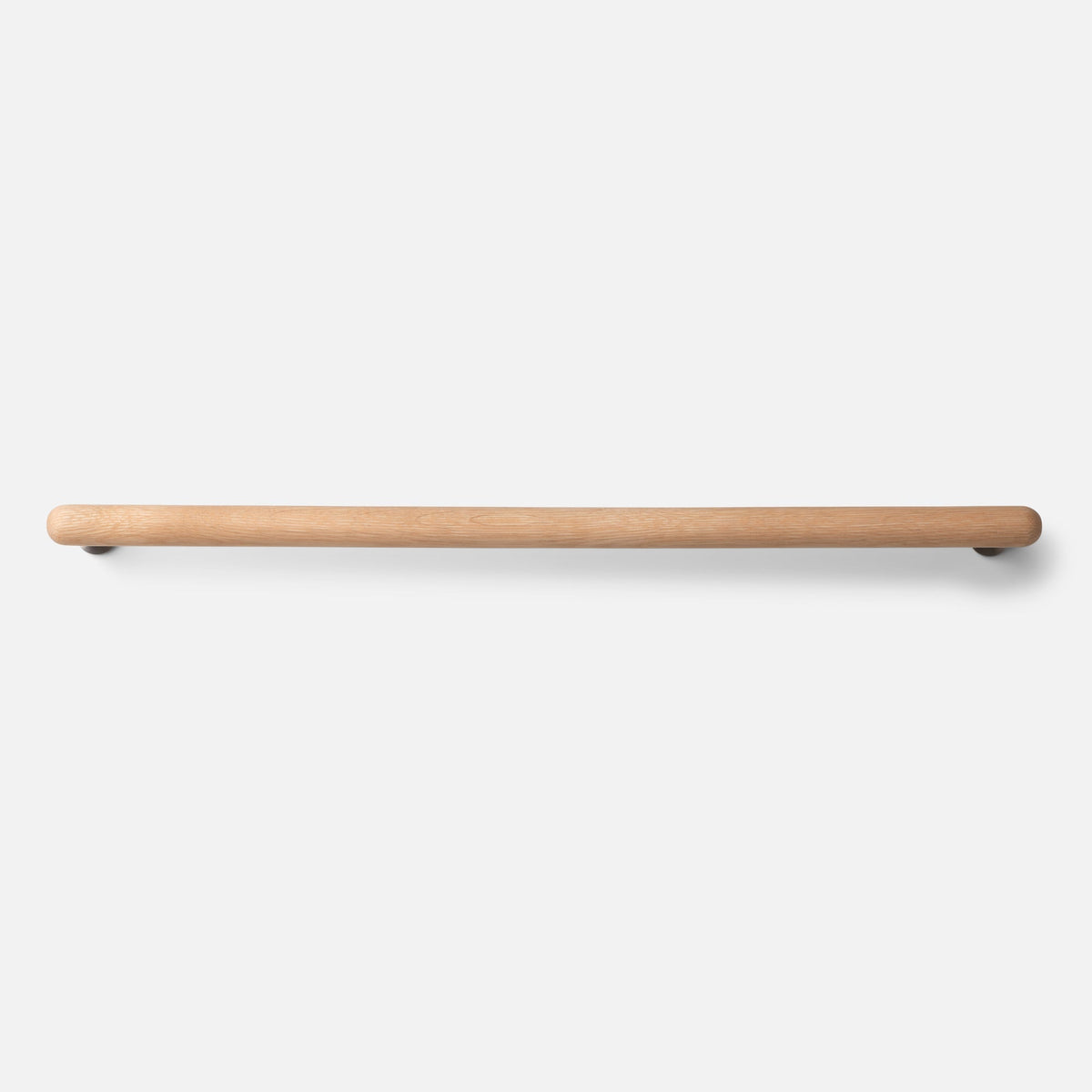 Front view of Oak Towel Bar showcasing its warm natural oak wood finish and rounded ends against a white background