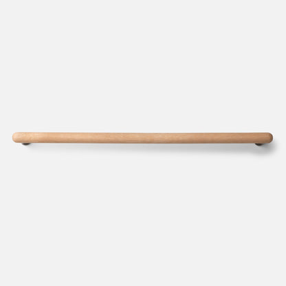 Front view of Oak Towel Bar showcasing its warm natural oak wood finish and rounded ends against a white background