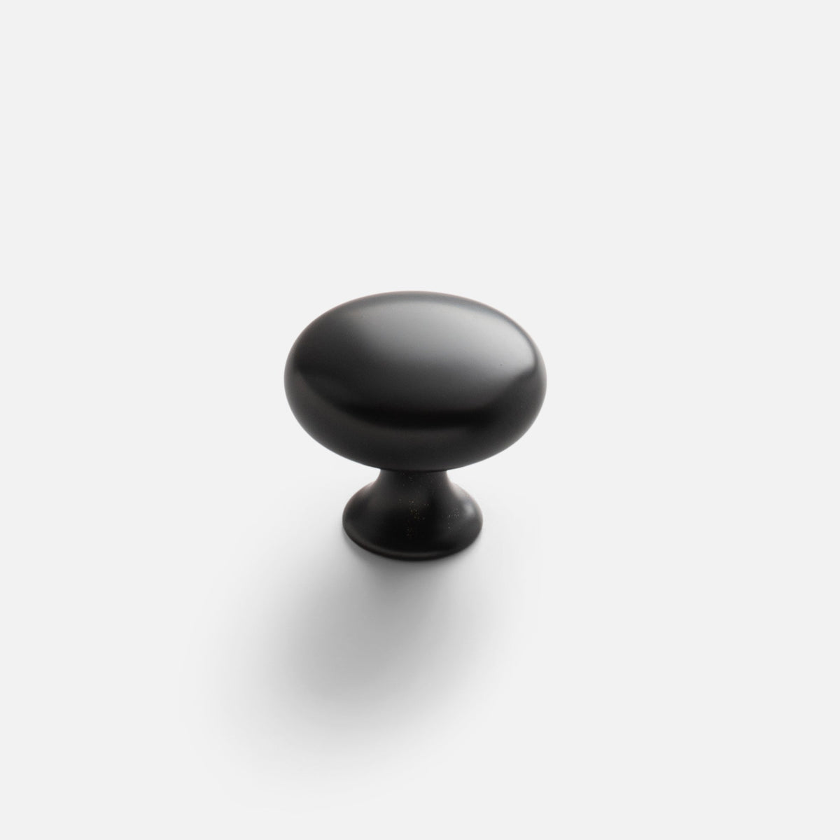 Front view of Somerset Knob showcasing its black egg-shaped silhouette on a white background