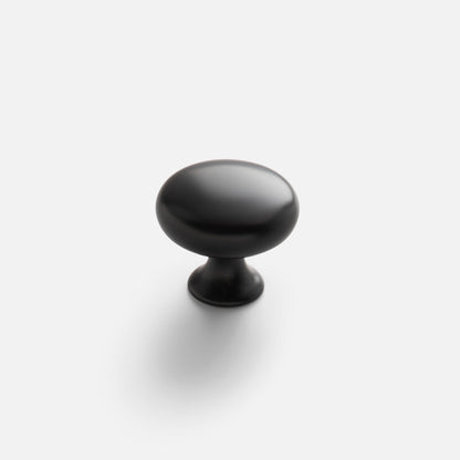 Front view of Somerset Knob showcasing its black egg-shaped silhouette on a white background