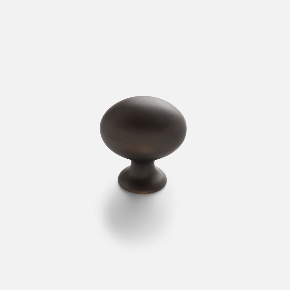 Front view of Somerset Knob showcasing its egg-shaped silhouette in a dark finish against a white background
