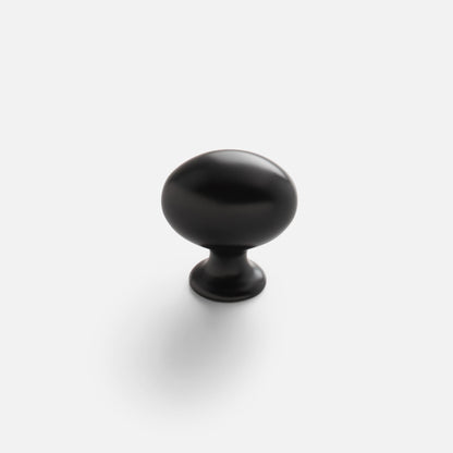 Front view of Somerset Knob showcasing its egg-shaped silhouette in a black finish against a white background
