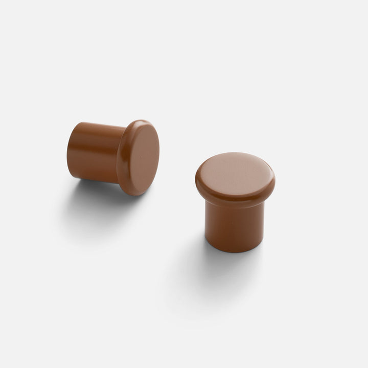 Front and side views of the Remy Knob showcasing its soft curves and pared-down silhouette on a light background