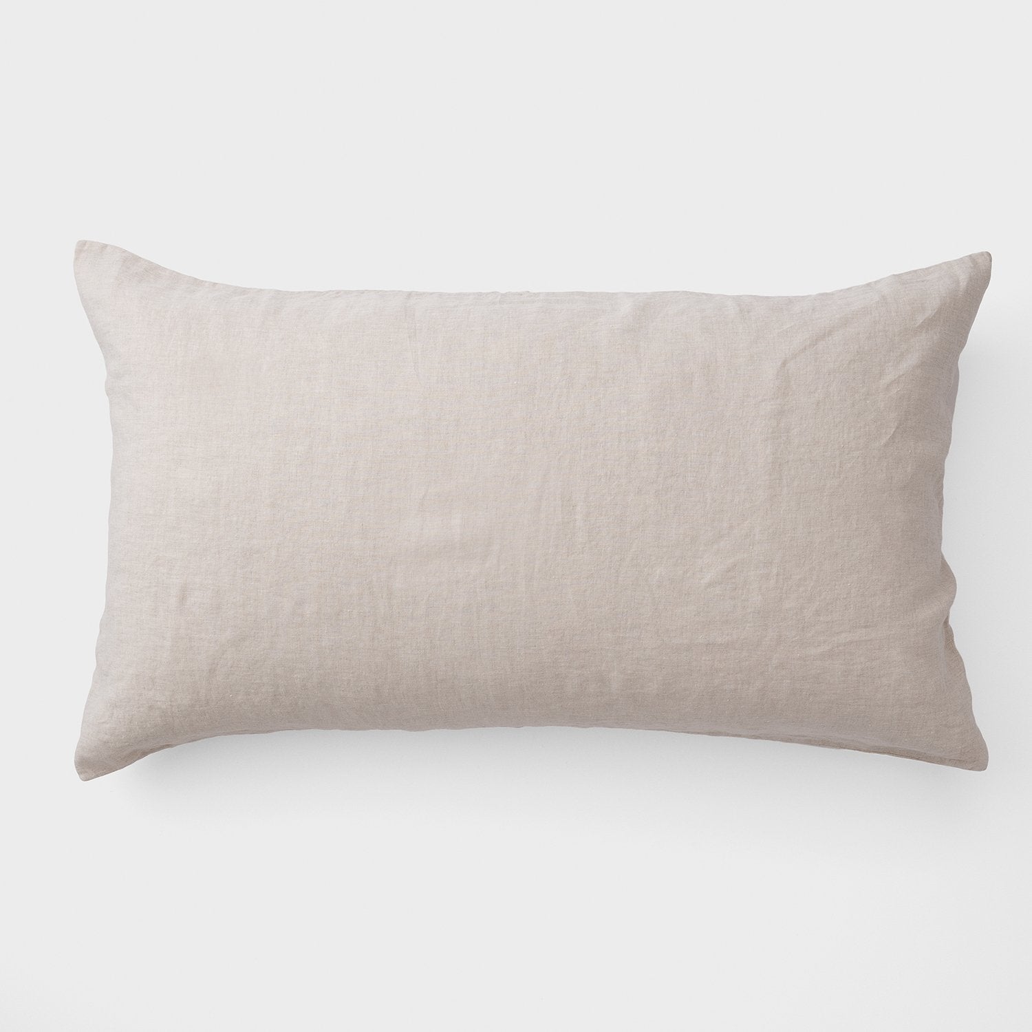 Top view of Linen Pillow Sham showcasing natural textured 100 percent linen fabric and back envelope closure on white background