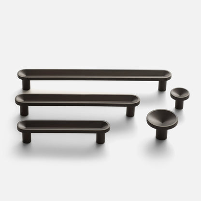 Rhone Knob hardware assortment showing textured bar pulls and round knobs on a white background