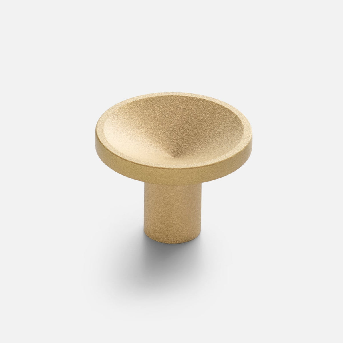 Front view of Rhone Cast Brass Knob showcasing its textured bowl shape on a light gray background