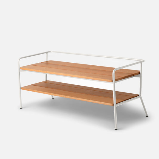 Front three-quarter view of Ronda Entryway Bench showcasing teak slat shelves and white steel frame on a light gray background