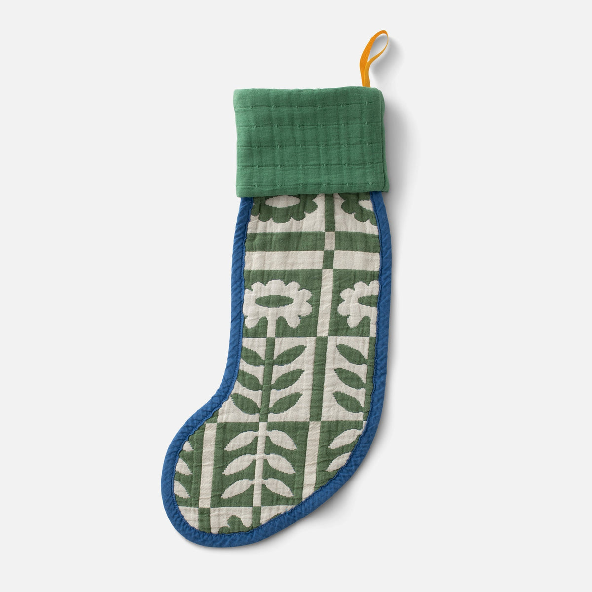 Front view of Stillwater Stocking showcasing green and cream floral pattern with blue trim on a white background