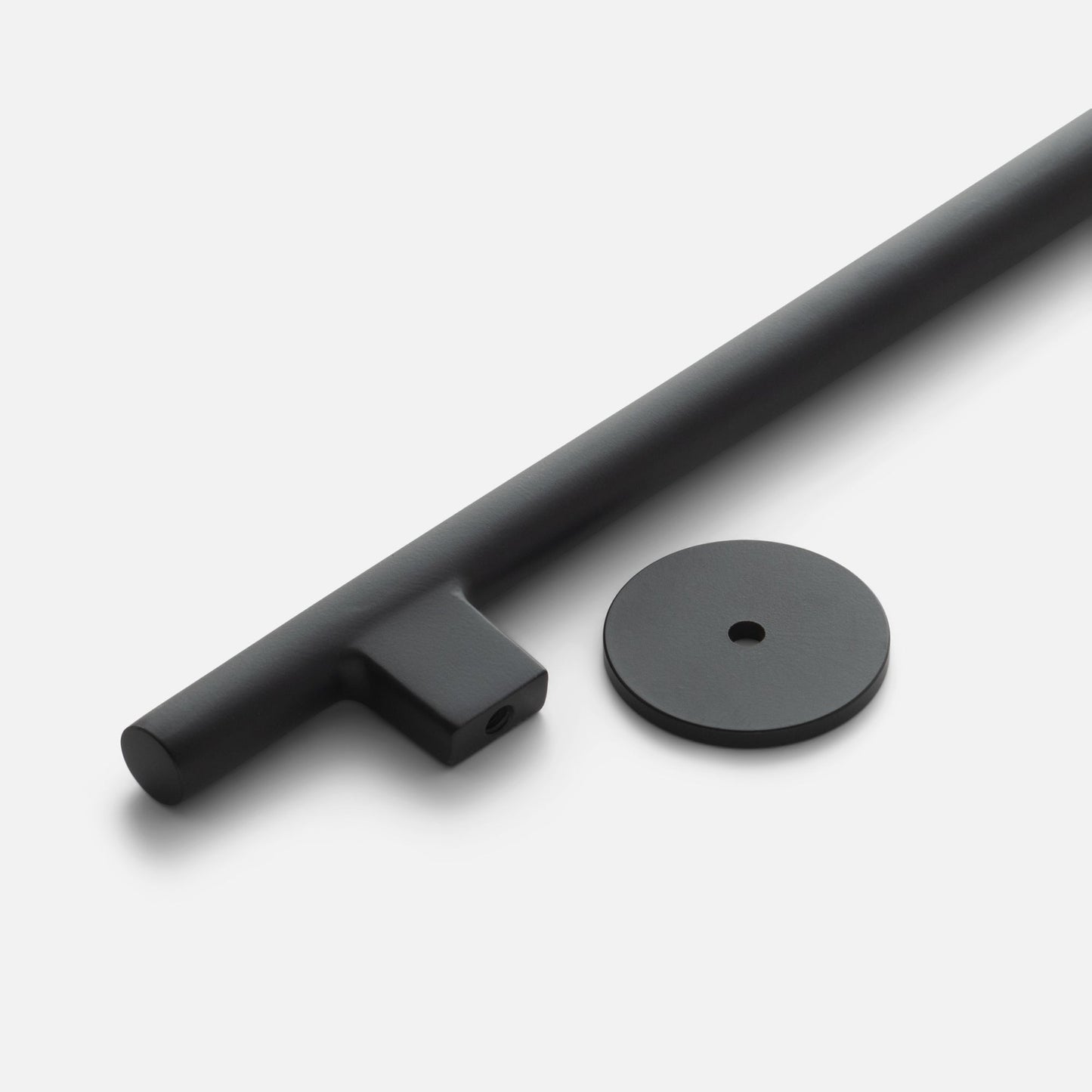 Angled close-up of Galley Pull showcasing True Black matte finish and round backplate on white background